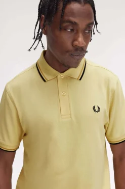 polo hombre Fred Perry m3600 y61 dorado nido de abeja negro